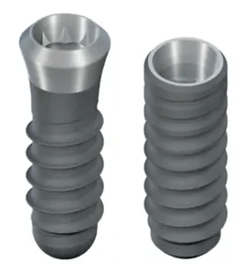 The top of the tissue level non-immersion dental implant, which appears smooth and polished.